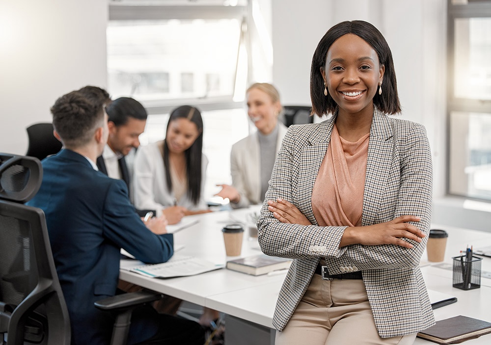 Portrait, black woman and lawyer with arms crossed for business, leadership and office meeting. Face, confidence and happy African female entrepreneur, professional and attorney with success mindset